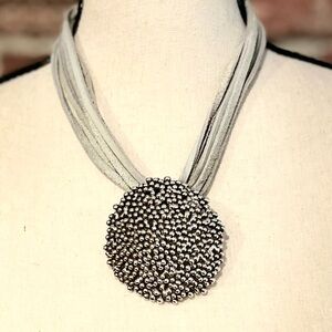 Make a statement with this unique necklace!